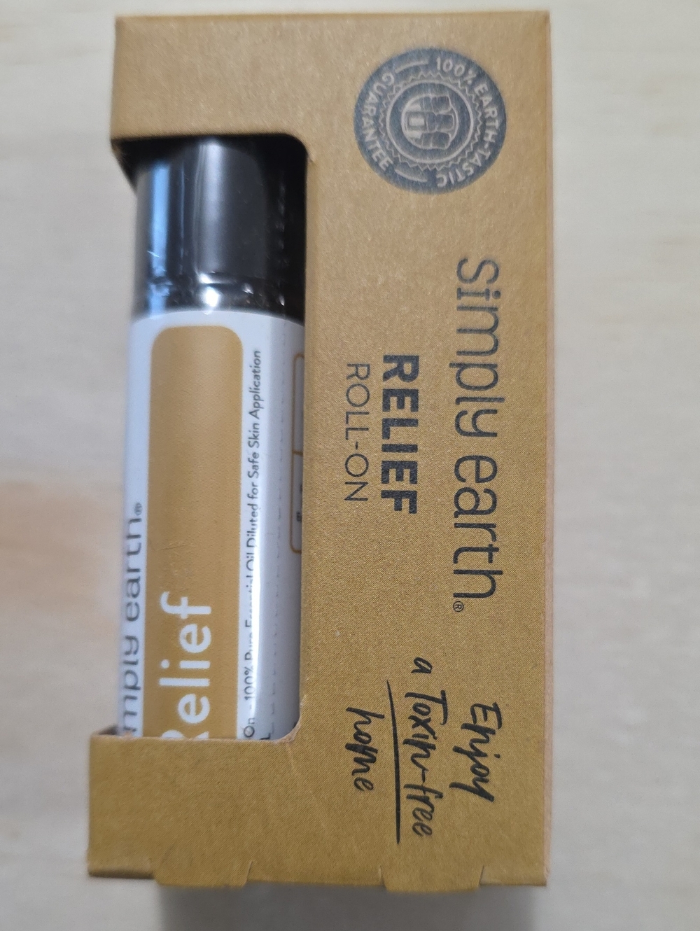 Simply Earth Relief Roll-On in Gold